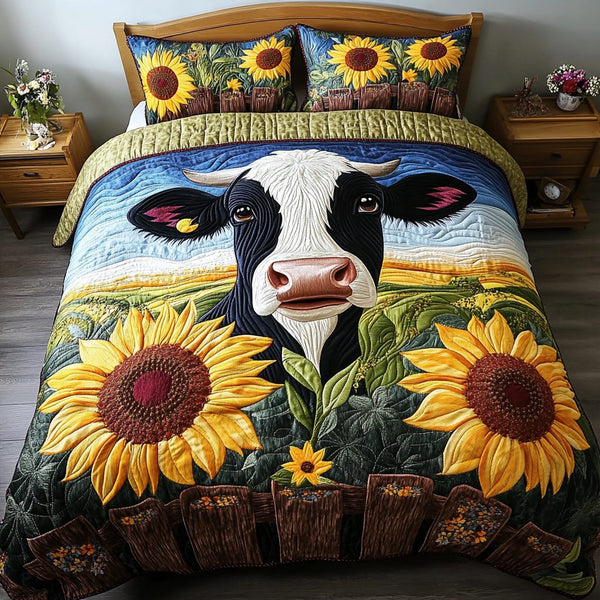 Grazing Glow quilted 3-piece bedding set on a made bed with two matching pillow shams