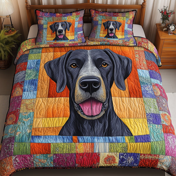 Great Dane quilted 3-piece bedding set on a made bed with two matching pillow shams