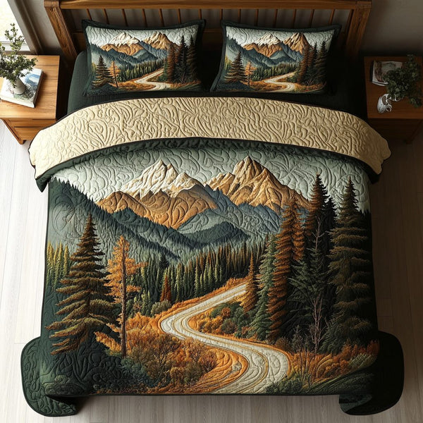 Great Smoky Mountain Trail quilted 3-piece bedding set on a made bed with two matching pillow shams