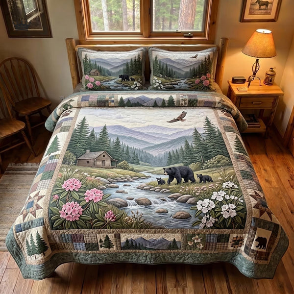 Great Smoky Mountains quilted 3-piece bedding set on a made bed with two matching pillow shams
