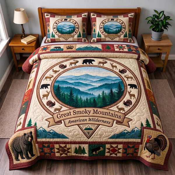 Great Smoky Mountains quilted 3-piece bedding set on a made bed with two matching pillow shams