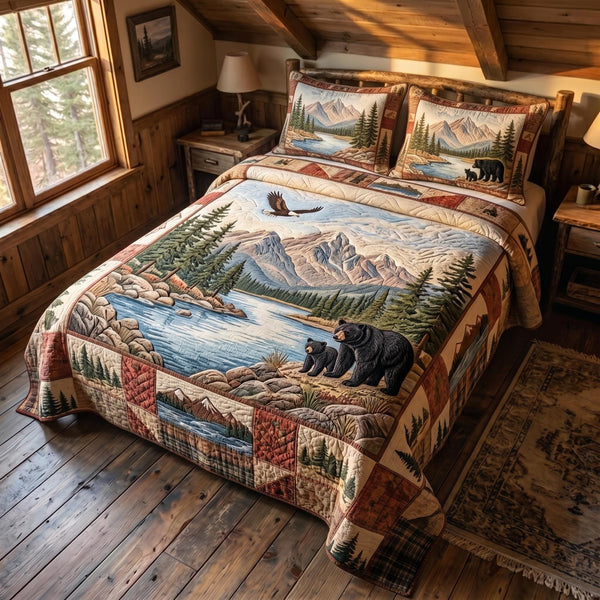 Great Smoky Mountains quilted 3-piece bedding set on a made bed with two matching pillow shams