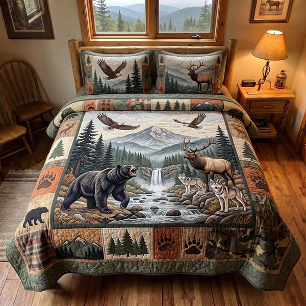 Great Smoky Mountains quilted 3-piece bedding set on a made bed with two matching pillow shams