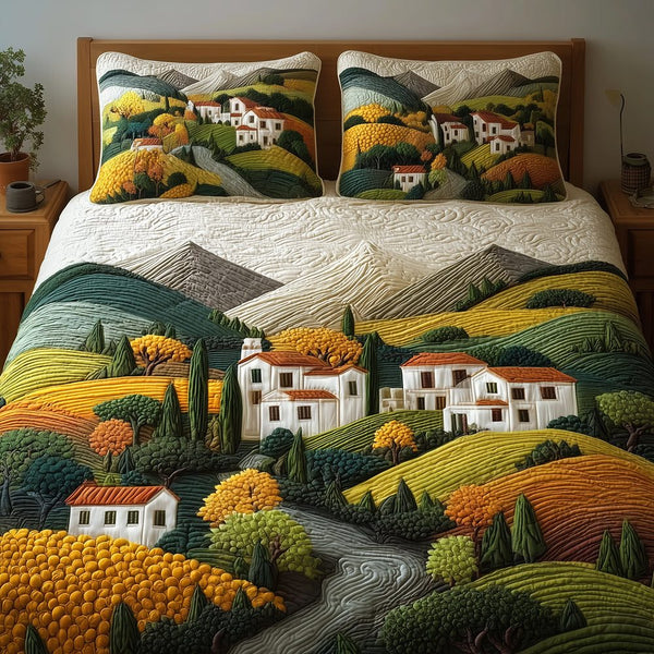 Green Hills quilted 3-piece bedding set on a made bed with two matching pillow shams
