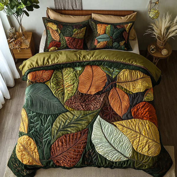 Green Leaf quilted 3-piece bedding set on a made bed with two matching pillow shams