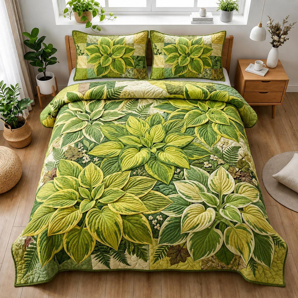 Green Serenity quilted 3-piece bedding set on a made bed with two matching pillow shams