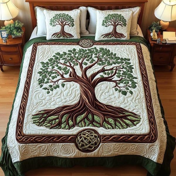 Green Serenity quilted 3-piece bedding set on a made bed with two matching pillow shams