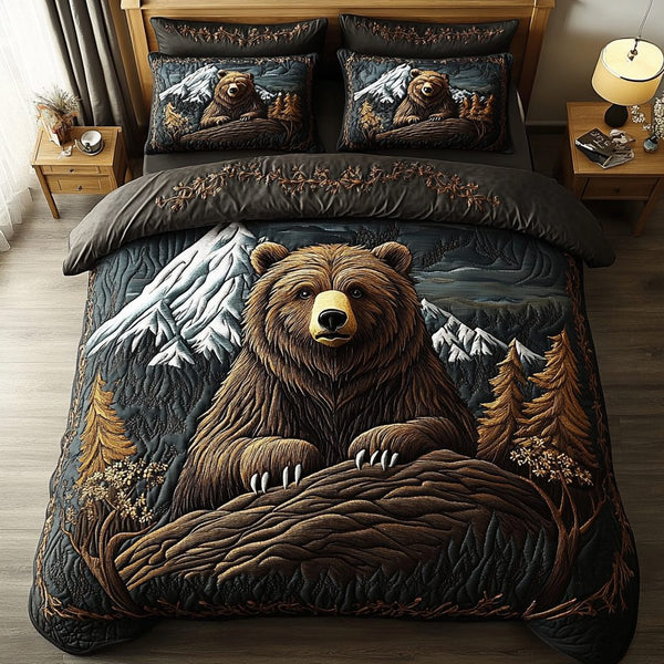 Grizzly Spirit quilted 3-piece bedding set on a made bed with two matching pillow shams