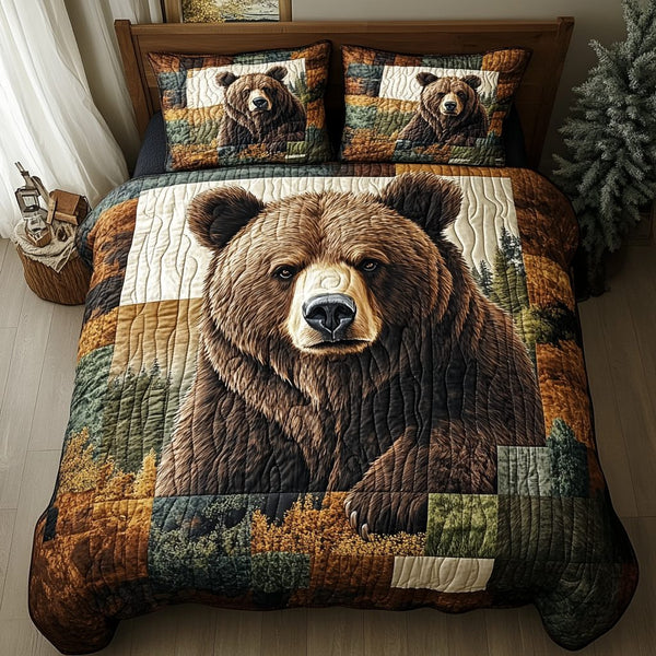 Grizzly Trail quilted 3-piece bedding set on a made bed with two matching pillow shams