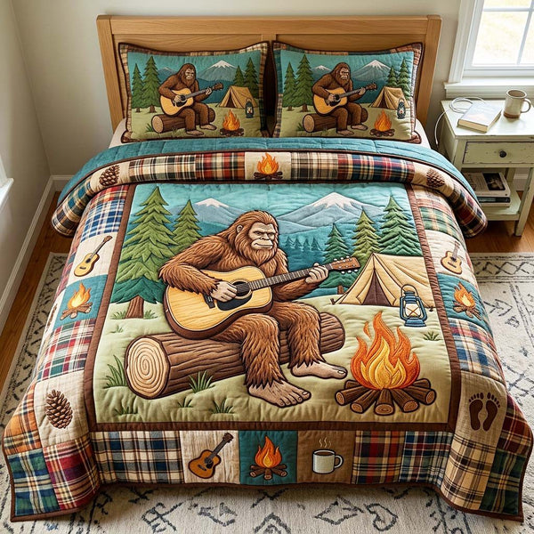 Guitar Bigfoot quilted 3-piece bedding set on a made bed with two matching pillow shams
