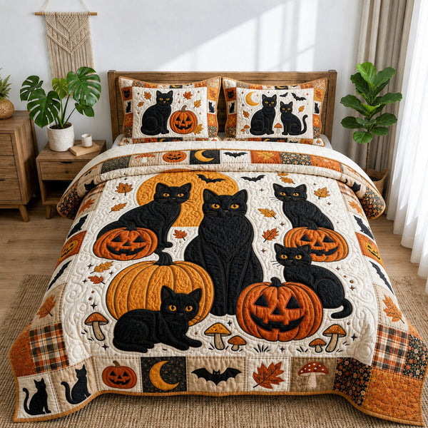 Halloween Black Cats quilted 3-piece bedding set on a made bed against a dark styled interior