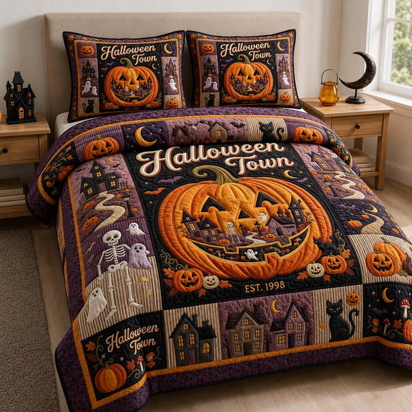 Halloween Town quilted 3-piece bedding set on a made bed against a dark styled interior