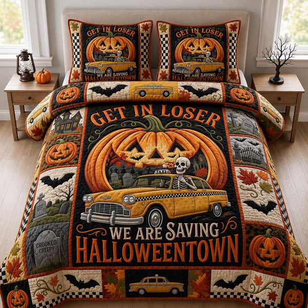 Halloween Town quilted 3-piece bedding set on a made bed against a dark styled interior
