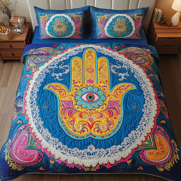 Hamsa Protection quilted 3-piece bedding set on a made bed with two matching pillow shams