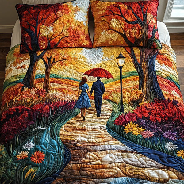 Hand in Hand quilted 3-piece bedding set on a made bed with two matching pillow shams
