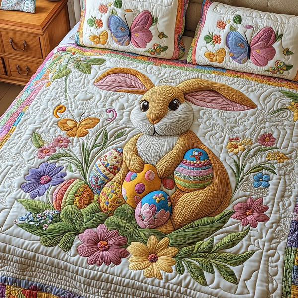 Happy Easter Day quilted 3-piece bedding set on a made bed with two matching pillow shams