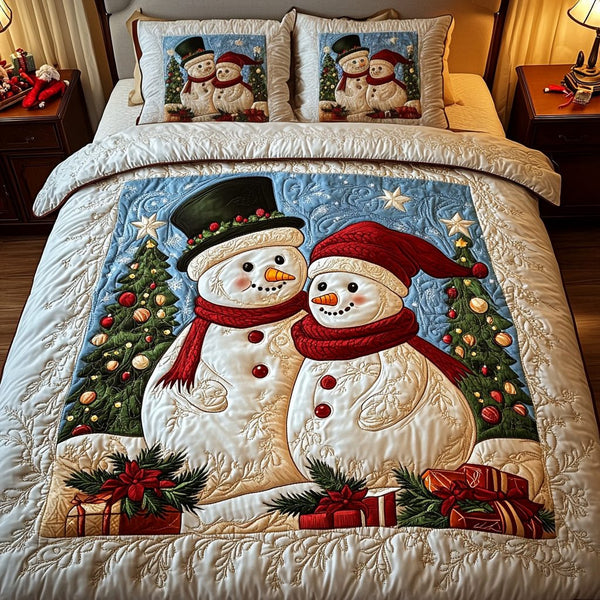 Happy Snowmen quilted 3-piece bedding set on a made bed with two matching pillow shams