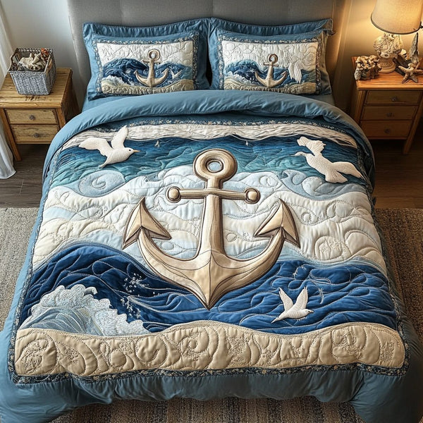 Harbor Anchor quilted 3-piece bedding set on a made bed in a light coastal bedroom