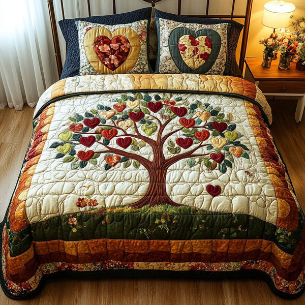 Harmony Orchard quilted 3-piece bedding set on a made bed with two matching pillow shams