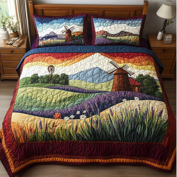 Harmony Windmill quilted 3-piece bedding set on a made bed with two matching pillow shams