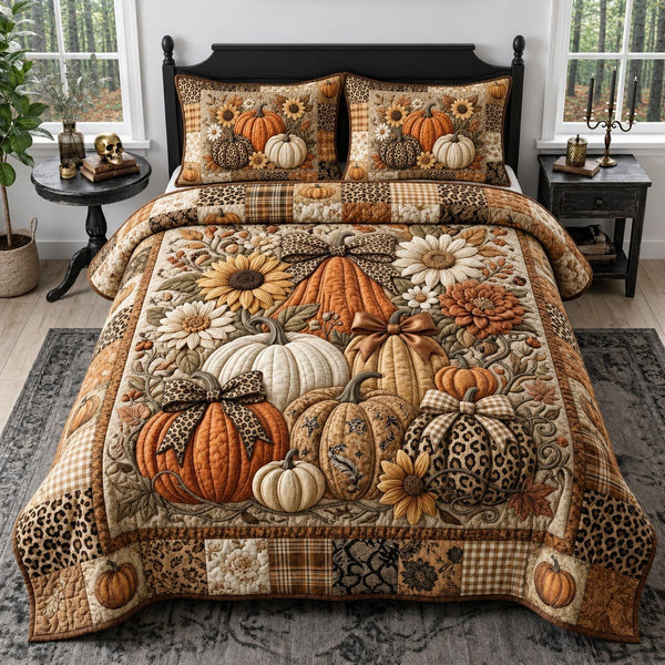 Harvest Glam quilted 3-piece bedding set on a made bed with two matching pillow shams