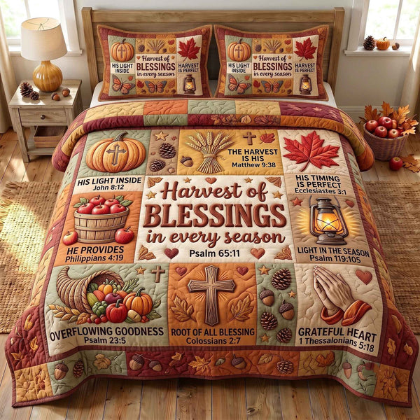 Harvest Of Blessings quilted 3-piece bedding set on a made bed with two matching pillow shams