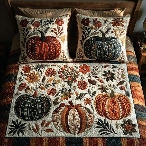 Harvest Pumpkins quilted 3-piece bedding set on a made bed against a dark styled interior