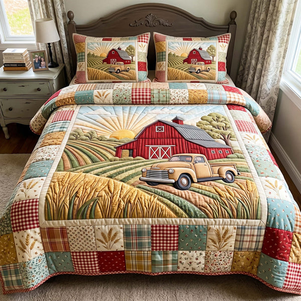 Harvest Sunrise quilted 3-piece bedding set on a made bed with two matching pillow shams