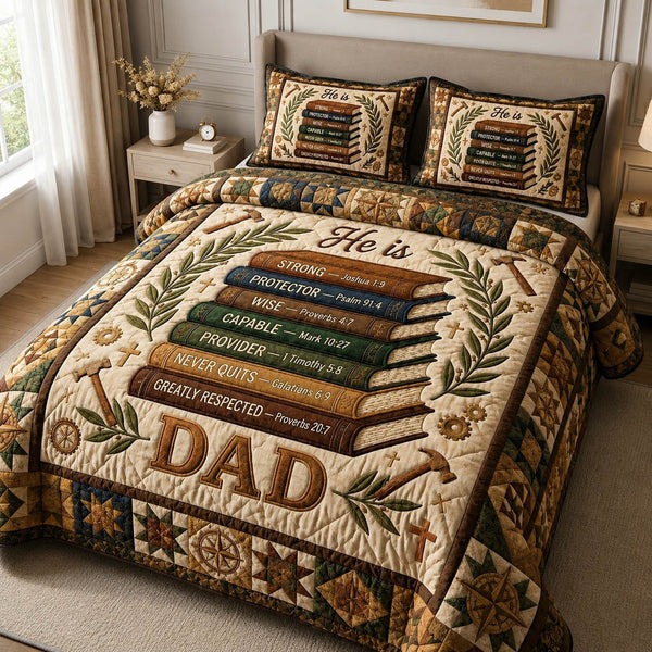 He is Strong Dad quilted 3-piece bedding set on a made bed with two matching pillow shams