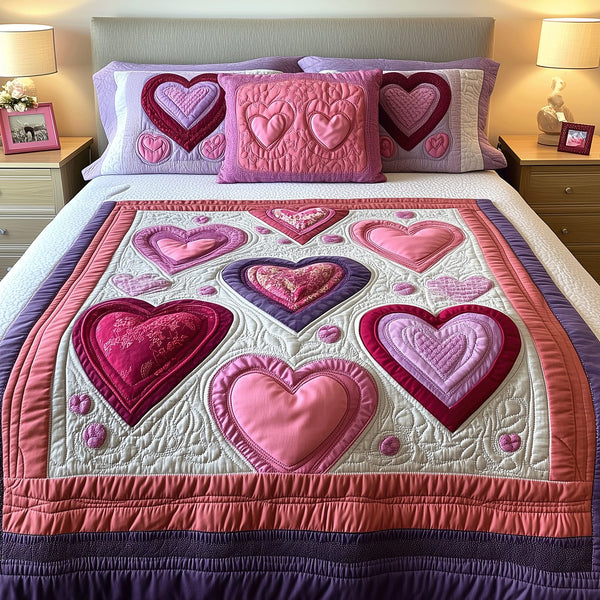 Heart Bloom quilted 3-piece bedding set on a made bed with two matching pillow shams