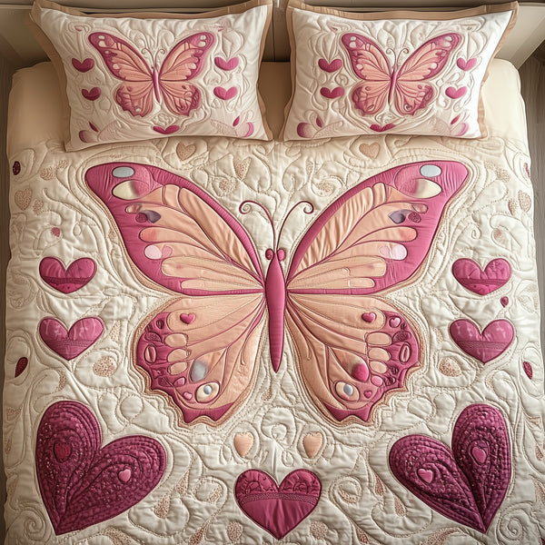 Heart Butterfly quilted 3-piece bedding set on a made bed with two matching pillow shams