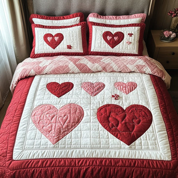 Heart Family quilted 3-piece bedding set on a made bed with two matching pillow shams