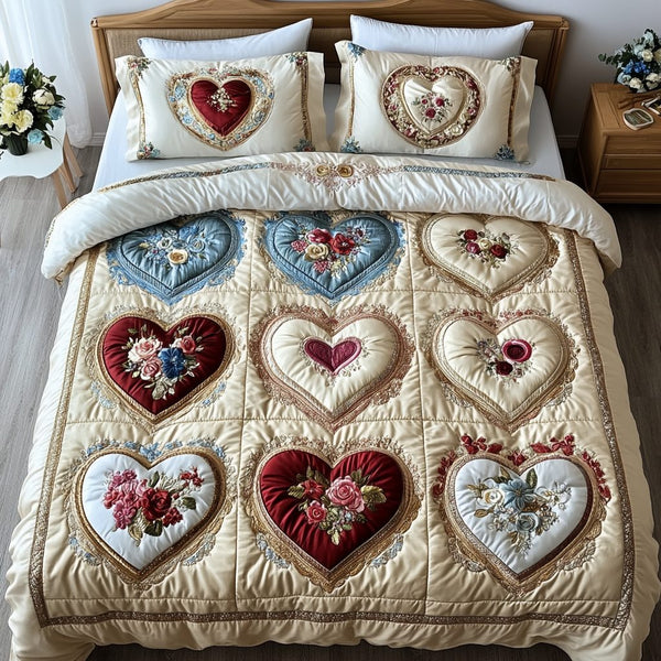 Heart Haven quilted 3-piece bedding set on a made bed with two matching pillow shams