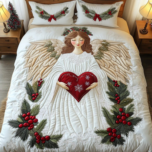 Heart of Joy quilted 3-piece bedding set on a made bed with two matching pillow shams