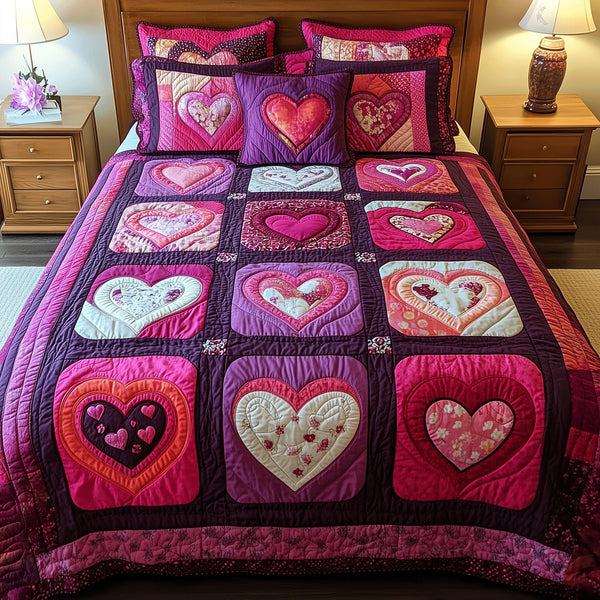 Heart Strings quilted 3-piece bedding set on a made bed with two matching pillow shams