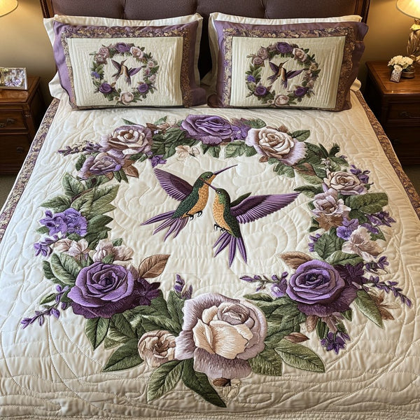 Heartbeat Harmony quilted 3-piece bedding set on a made bed with two matching pillow shams