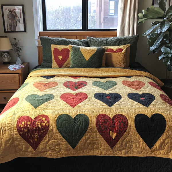 Heartfelt Tradition quilted 3-piece bedding set on a made bed with two matching pillow shams