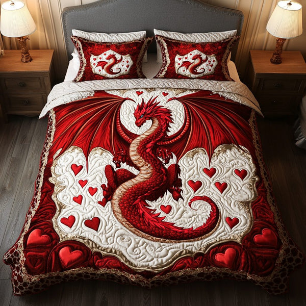 Heartfire Wings quilted 3-piece bedding set on a made bed with two matching pillow shams