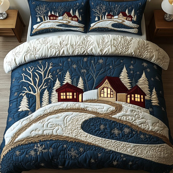 Hearth and Hills quilted 3-piece bedding set on a made bed with two matching pillow shams