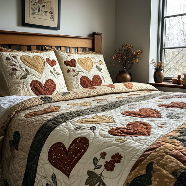 Hearth Heart quilted 3-piece bedding set on a made bed with two matching pillow shams