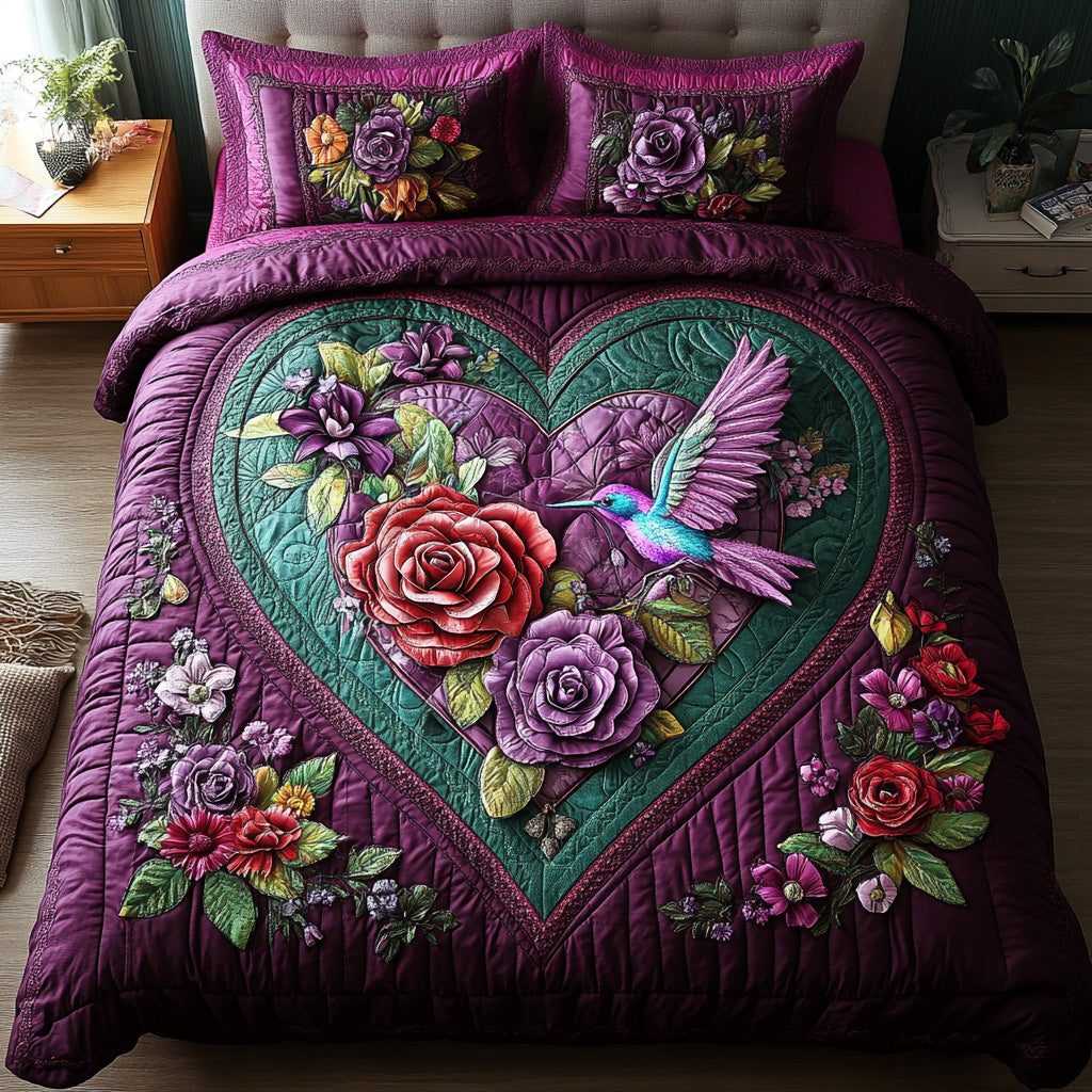 Heartline Whispers quilted 3-piece bedding set on a made bed with two matching pillow shams