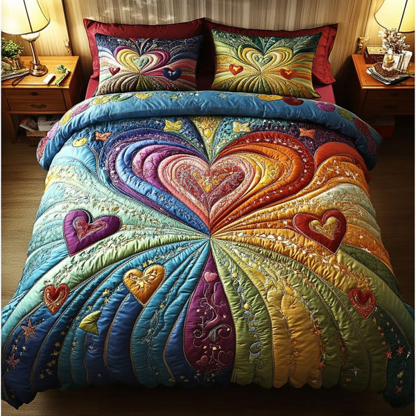 Heartstrings Bliss quilted 3-piece bedding set on a made bed with two matching pillow shams