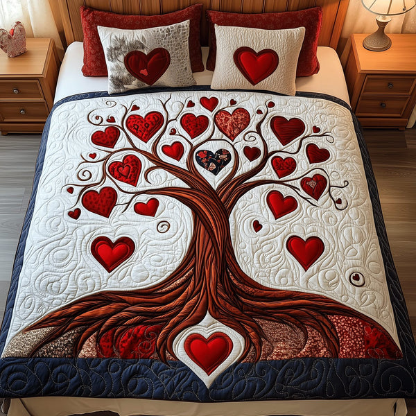 Heartstrings Tree quilted 3-piece bedding set on a made bed with two matching pillow shams