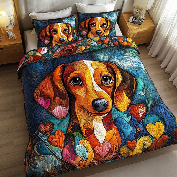 Heartwarming Eyes quilted 3-piece bedding set on a made bed with two matching pillow shams