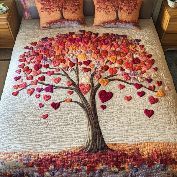 Heartwood quilted 3-piece bedding set on a made bed with two matching pillow shams