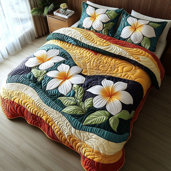 Heavenly Petals quilted 3-piece bedding set on a made bed in a softly lit bedroom