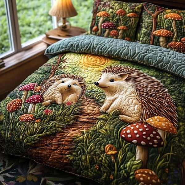 Hedgehog Haven quilted 3-piece bedding set on a made bed with two matching pillow shams