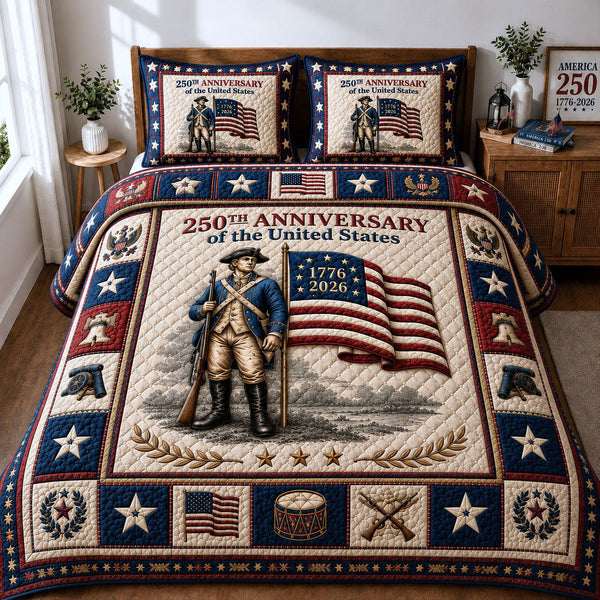 Heritage America 250 quilted 3-piece bedding set on a made bed in a warmly lit bedroom