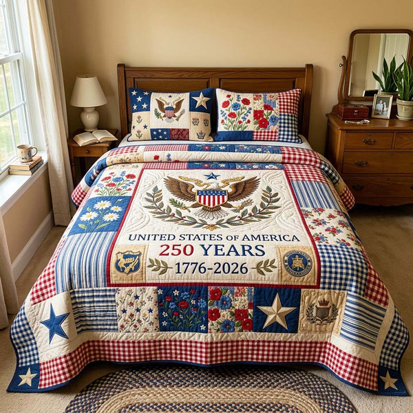 Heritage Eagle quilted 3-piece bedding set on a made bed in a warmly lit bedroom
