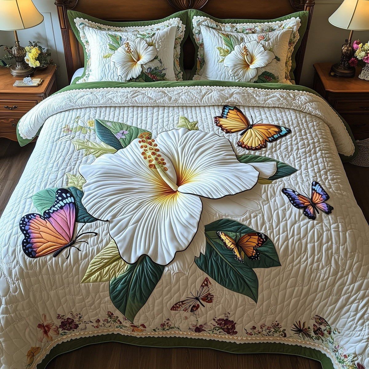 Hibicus Haven quilted 3-piece bedding set on a made bed with two matching pillow shams